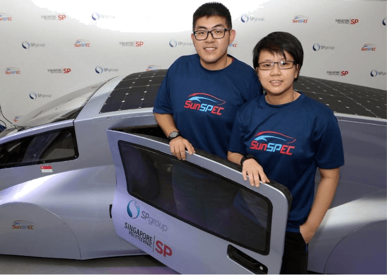 SP Group staff and Singapore Polytechnic alumni Leow Wei Lin, with Singapore Polytechnic student Sheryl Choo and the SunSPEC 5 solar car.